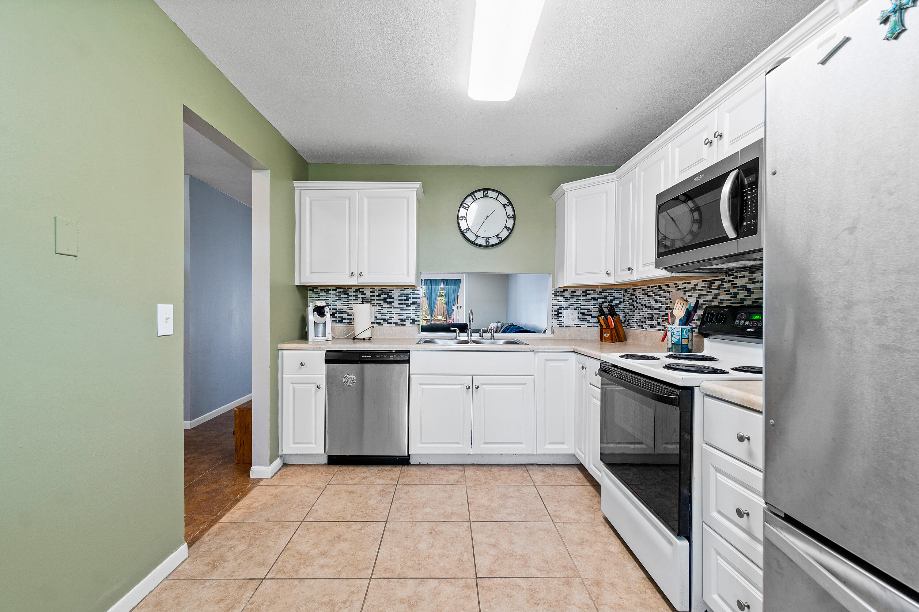 4616 Southeast Marie Way Stuart, FL 34997 - Photo 10 of 38 011-4616SoutheastMarieWay-Stuart-FL-3499