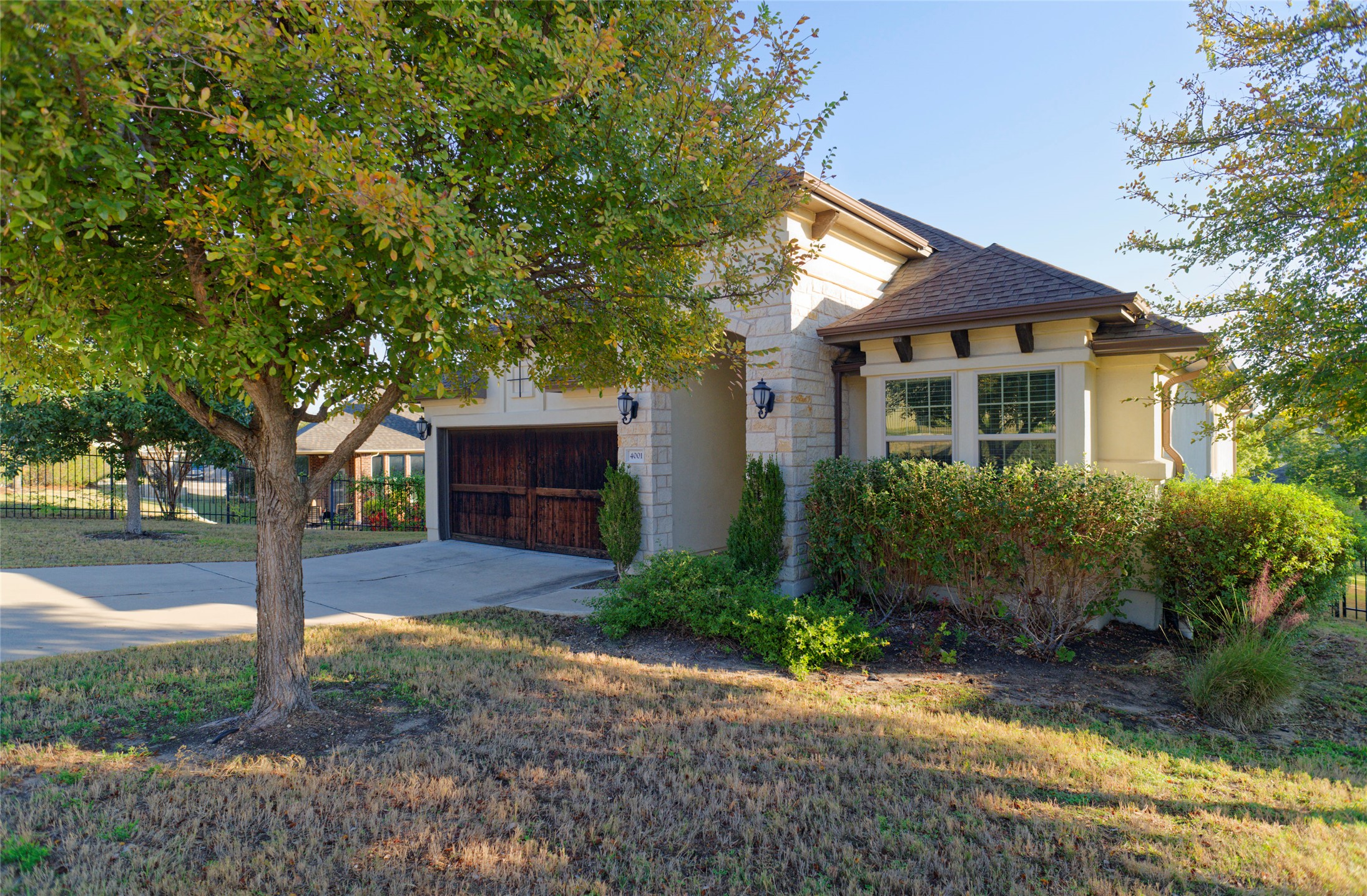 4001 Goodnight Trail Leander, TX 78641 - Photo 2 of 35 a front view of a house with garden