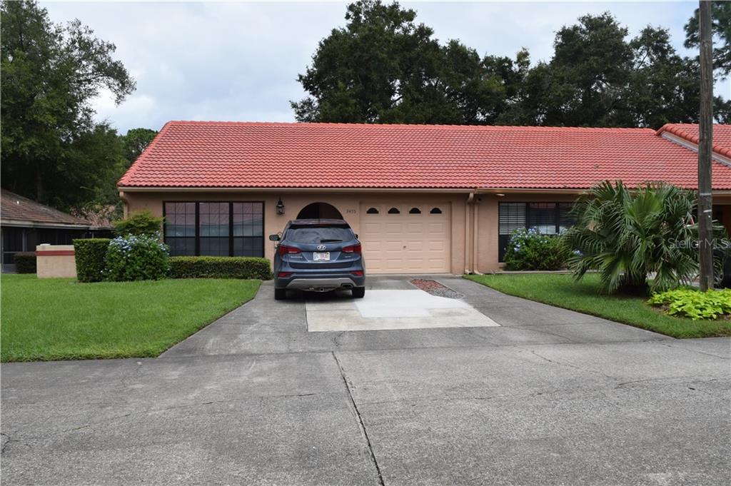 3455 Southwest 19th Street Ocala, FL 34474 - Photo 1 of 1 a house view with a garden space