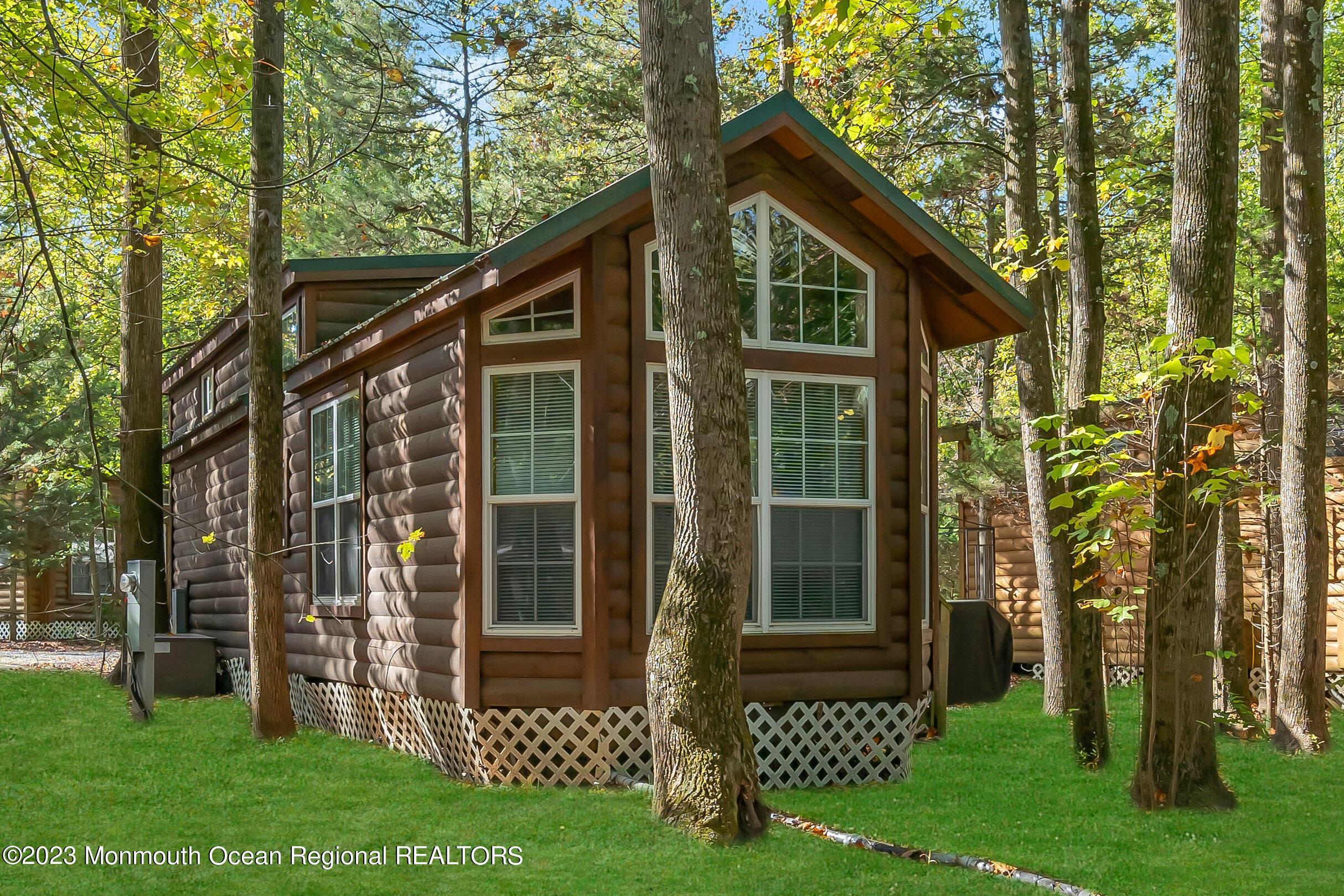 724 Monmouth Road, Unit 33 Cream Ridge, NJ 08514 - Photo 1 of 27 front view of a house with a yard