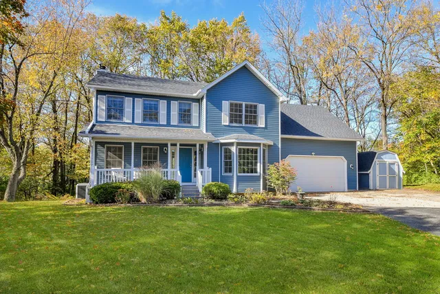 a view of a yard in front of a house