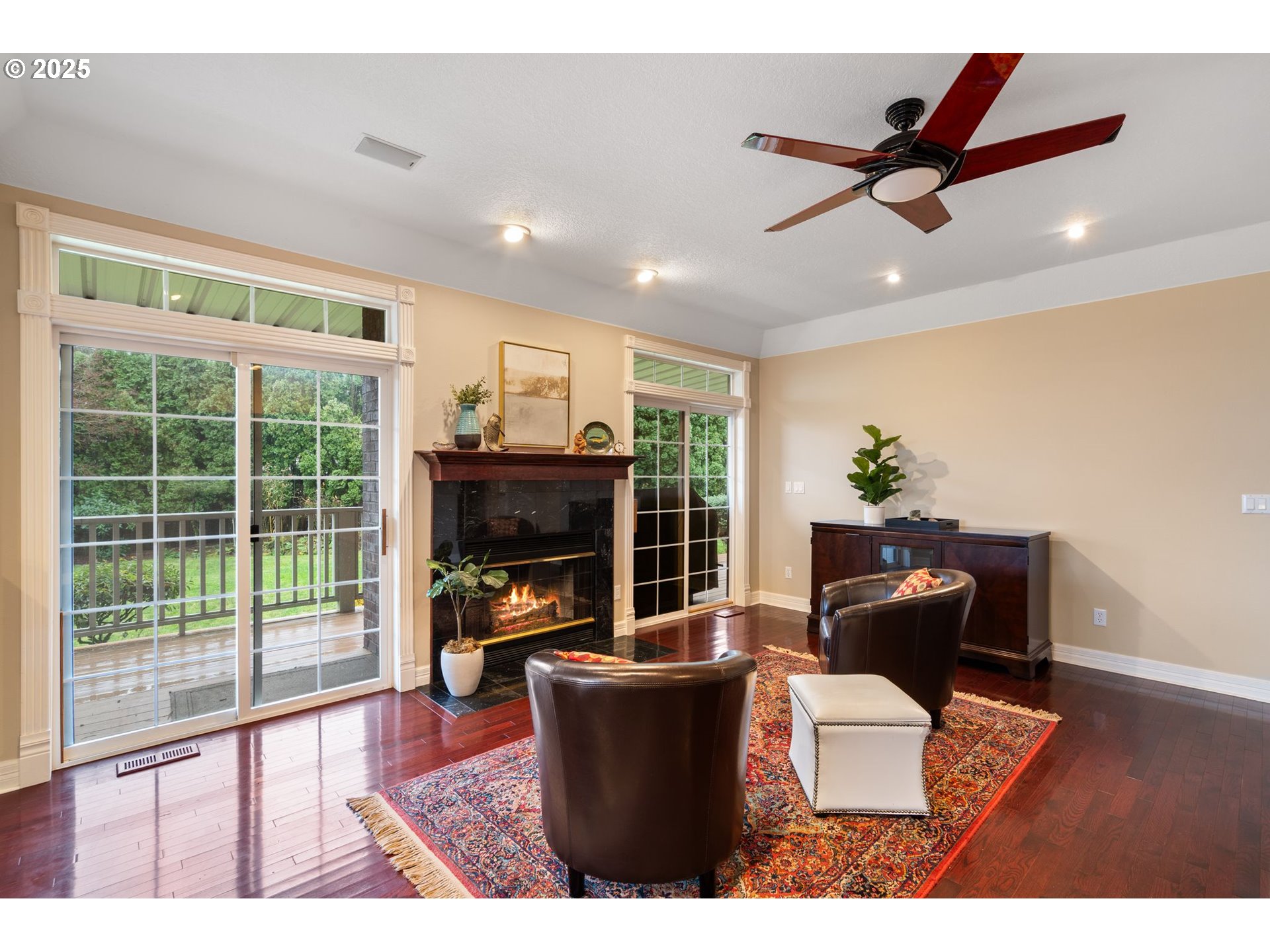5150 Northwest Valley Court Camas, WA 98607 - Photo 16 of 48 a living room with furniture and a fireplace