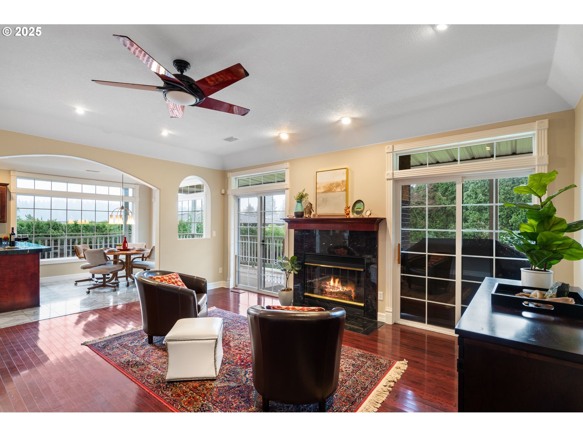 5150 Northwest Valley Court Camas, WA 98607 - Photo 17 of 48 a living room with furniture and a fireplace