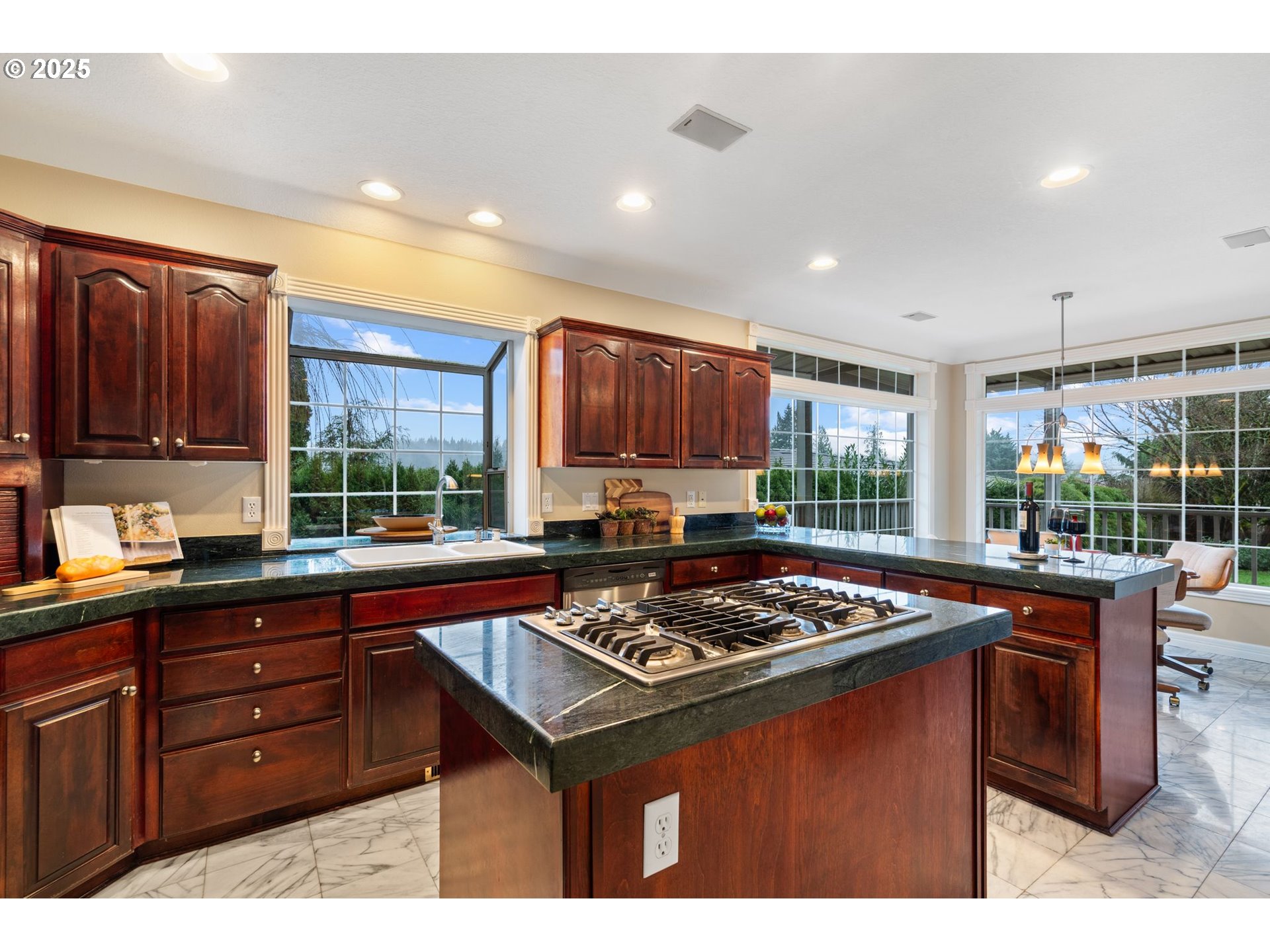 5150 Northwest Valley Court Camas, WA 98607 - Photo 21 of 48 a kitchen that has a sink and a stove in it