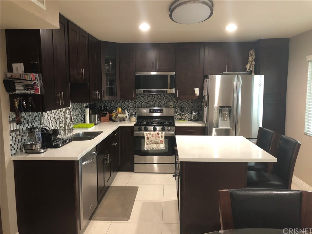 REMODELED KITCHEN WITH BREAKFAST AREA