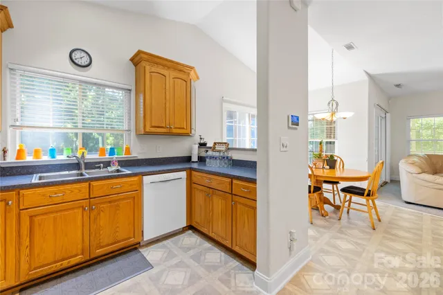 a view of living room with granite countertop furniture and a window