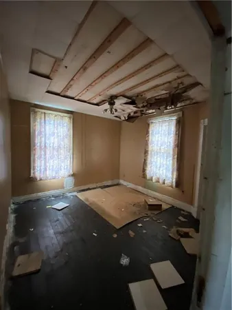 an empty room with windows