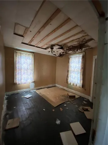 an empty room with windows