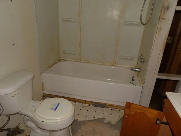 a bathroom with a sink and a toilet