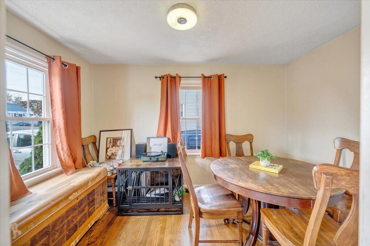 4915 Hildebrand Road Northwest Roanoke, VA 24012 - Photo 15 of 40 a view of a dining room with furniture window and outside view