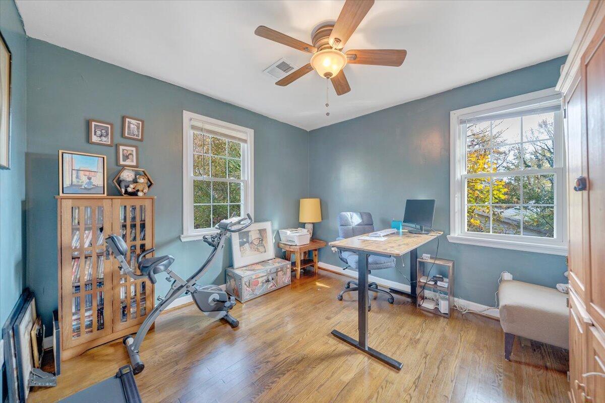 4915 Hildebrand Road Northwest Roanoke, VA 24012 - Photo 19 of 40 a living room with furniture and a wooden floor