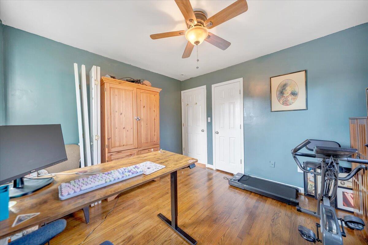 4915 Hildebrand Road Northwest Roanoke, VA 24012 - Photo 21 of 40 a bedroom with furniture and a window