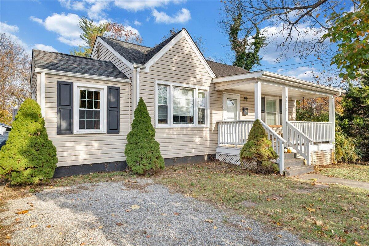 4915 Hildebrand Road Northwest Roanoke, VA 24012 - Photo 37 of 40 a view of a house with a yard