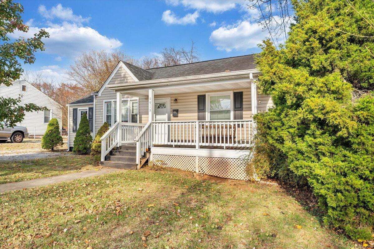 4915 Hildebrand Road Northwest Roanoke, VA 24012 - Photo 39 of 40 a front view of a house with a yard