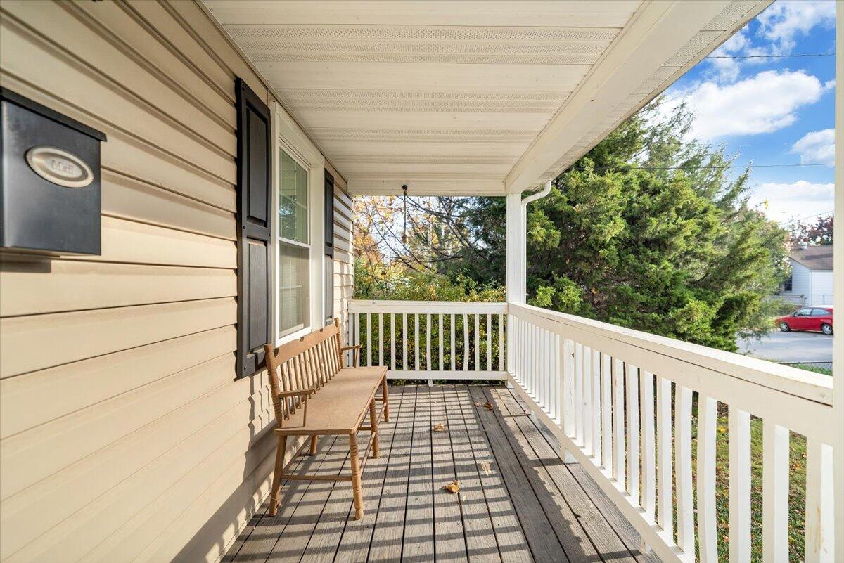 4915 Hildebrand Road Northwest Roanoke, VA 24012 - Photo 4 of 40 a view of a balcony with wooden floor