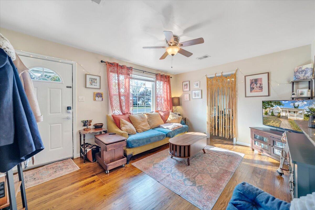 4915 Hildebrand Road Northwest Roanoke, VA 24012 - Photo 6 of 40 a living room with furniture and a large window