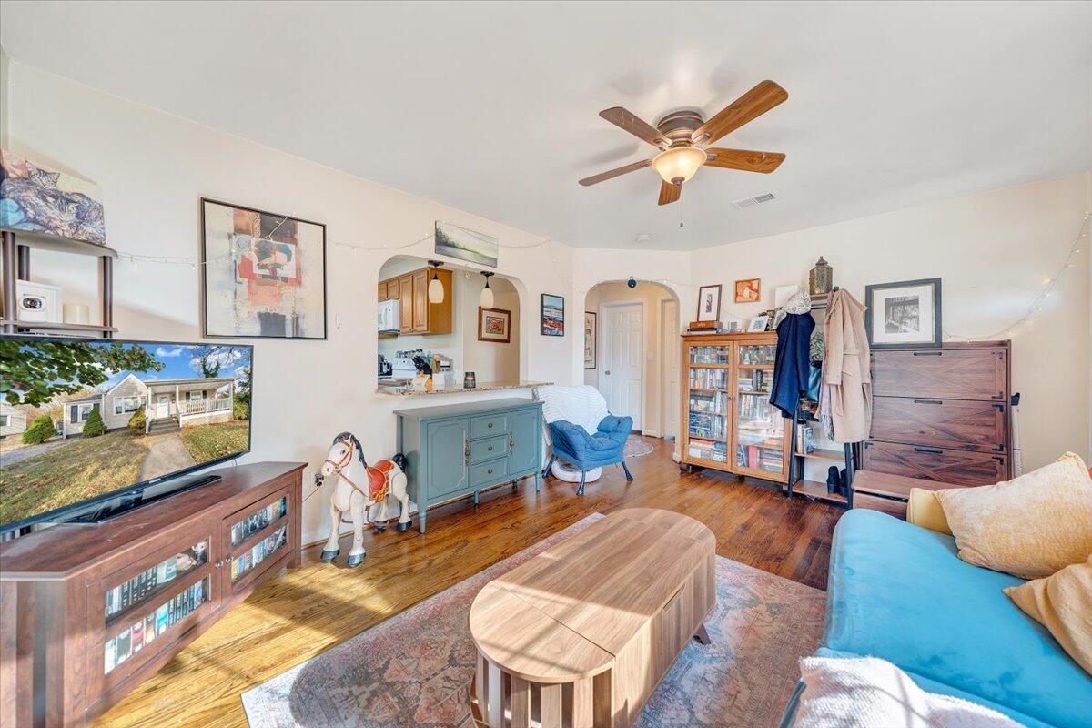 4915 Hildebrand Road Northwest Roanoke, VA 24012 - Photo 9 of 40 a living room with furniture and wooden floor