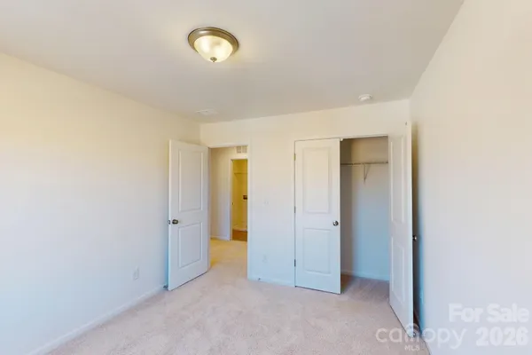 a view of room with closet area