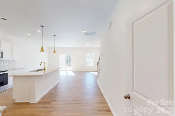 a view of a kitchen and a sink
