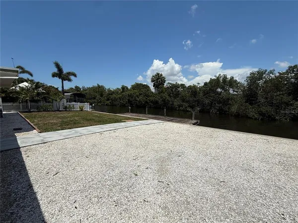 a view of an empty room with a garden