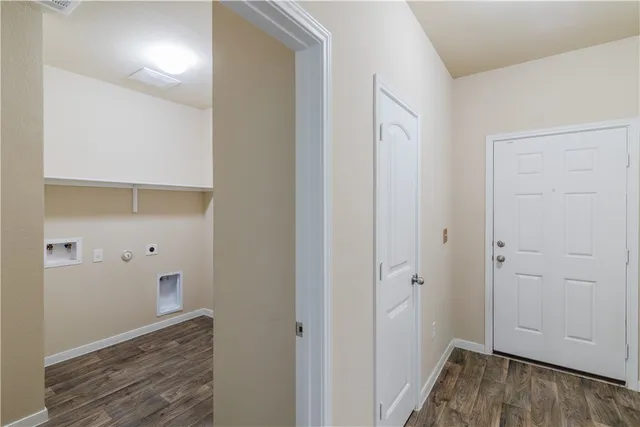 a view of hallway with closet