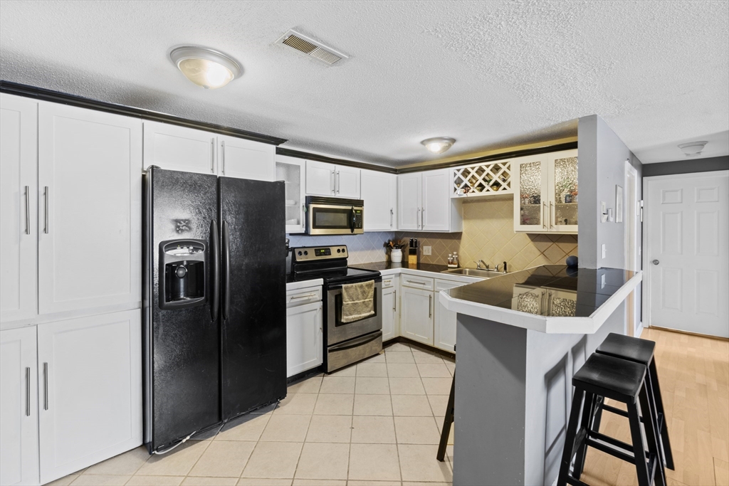 1607 Braley Road, Unit 70 New Bedford, MA 02745 - Photo 4 of 18