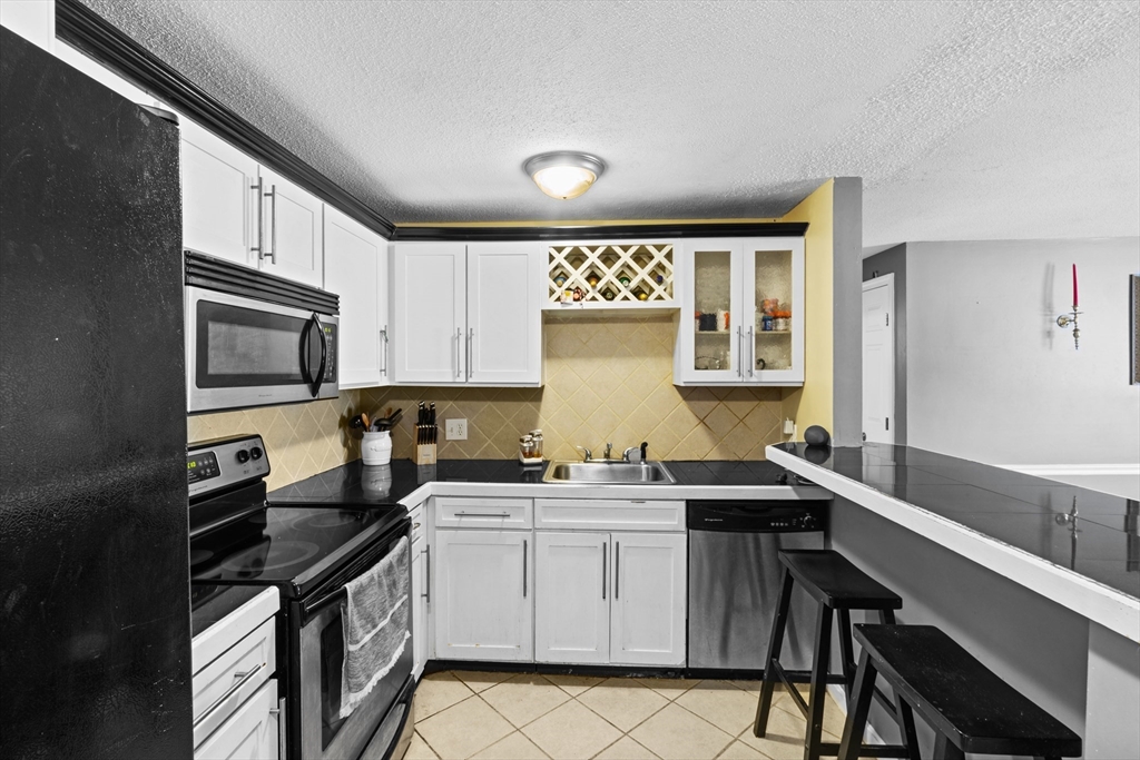 1607 Braley Road, Unit 70 New Bedford, MA 02745 - Photo 5 of 18