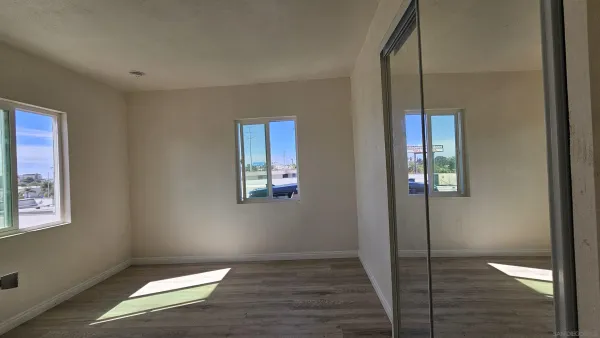 a view of an empty room and window