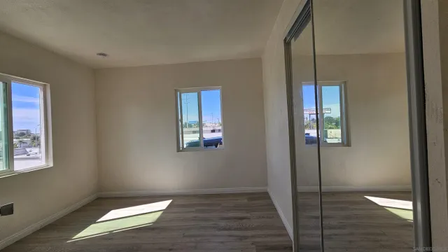 a view of an empty room and window