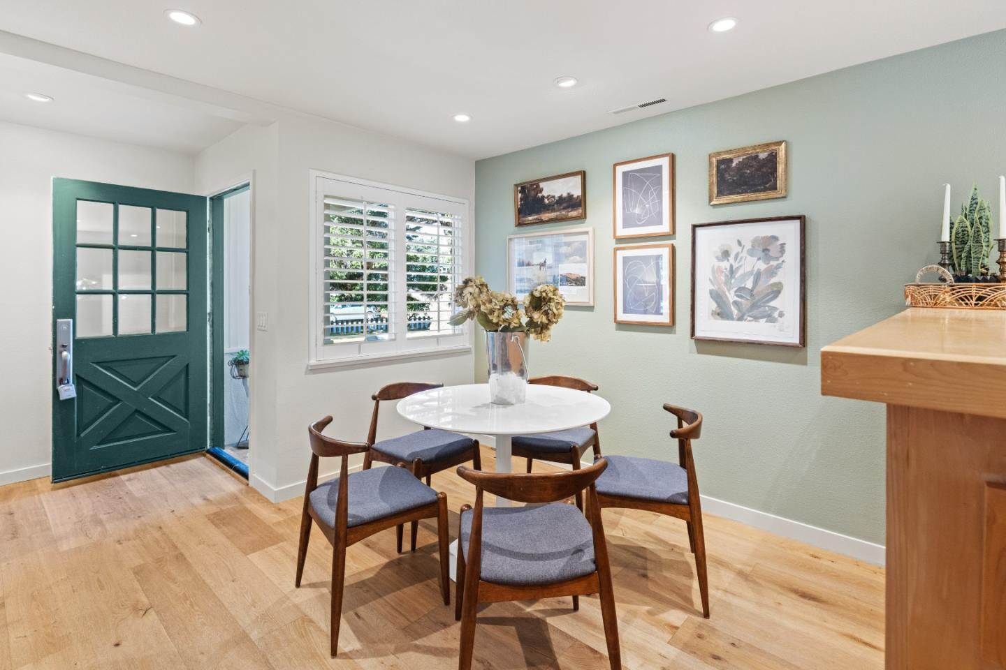 26571 Aspen Place Carmel, CA 93923 - Photo 11 of 46 a view of a dining room with furniture window and wooden floor