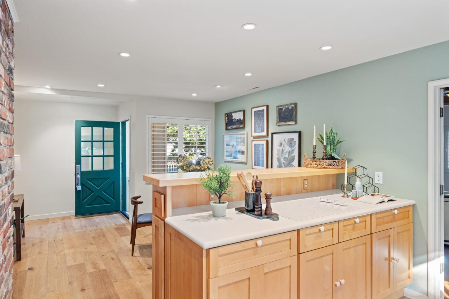 26571 Aspen Place Carmel, CA 93923 - Photo 16 of 46 a room with a table chairs and a kitchen