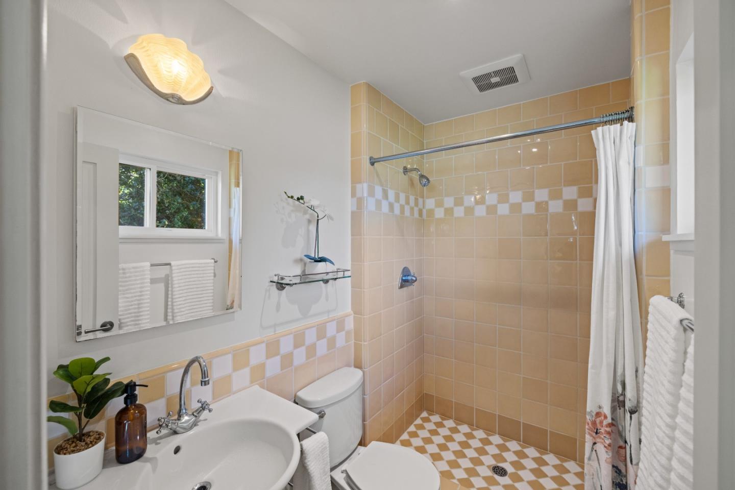 26571 Aspen Place Carmel, CA 93923 - Photo 24 of 46 a bathroom with a sink toilet and shower