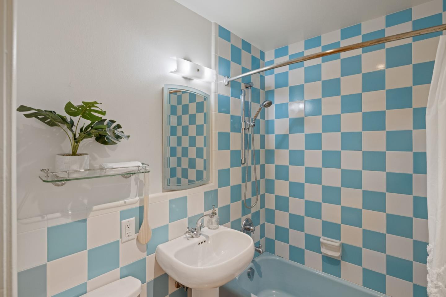 26571 Aspen Place Carmel, CA 93923 - Photo 27 of 46 a bathroom with a sink and a mirror