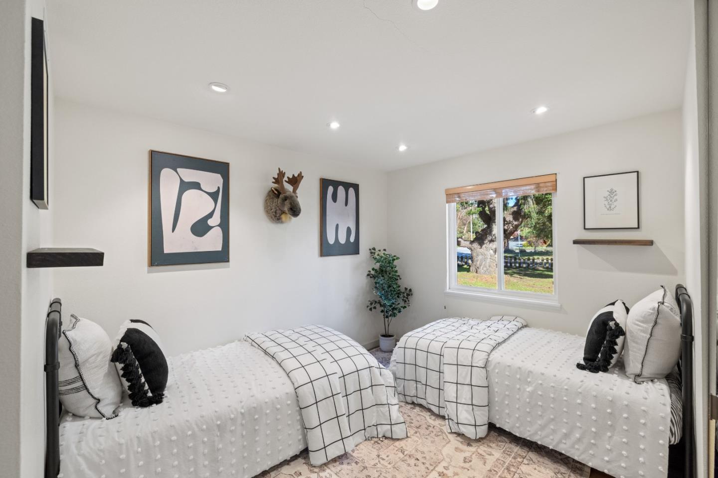 26571 Aspen Place Carmel, CA 93923 - Photo 28 of 46 a bedroom with furniture and a large window