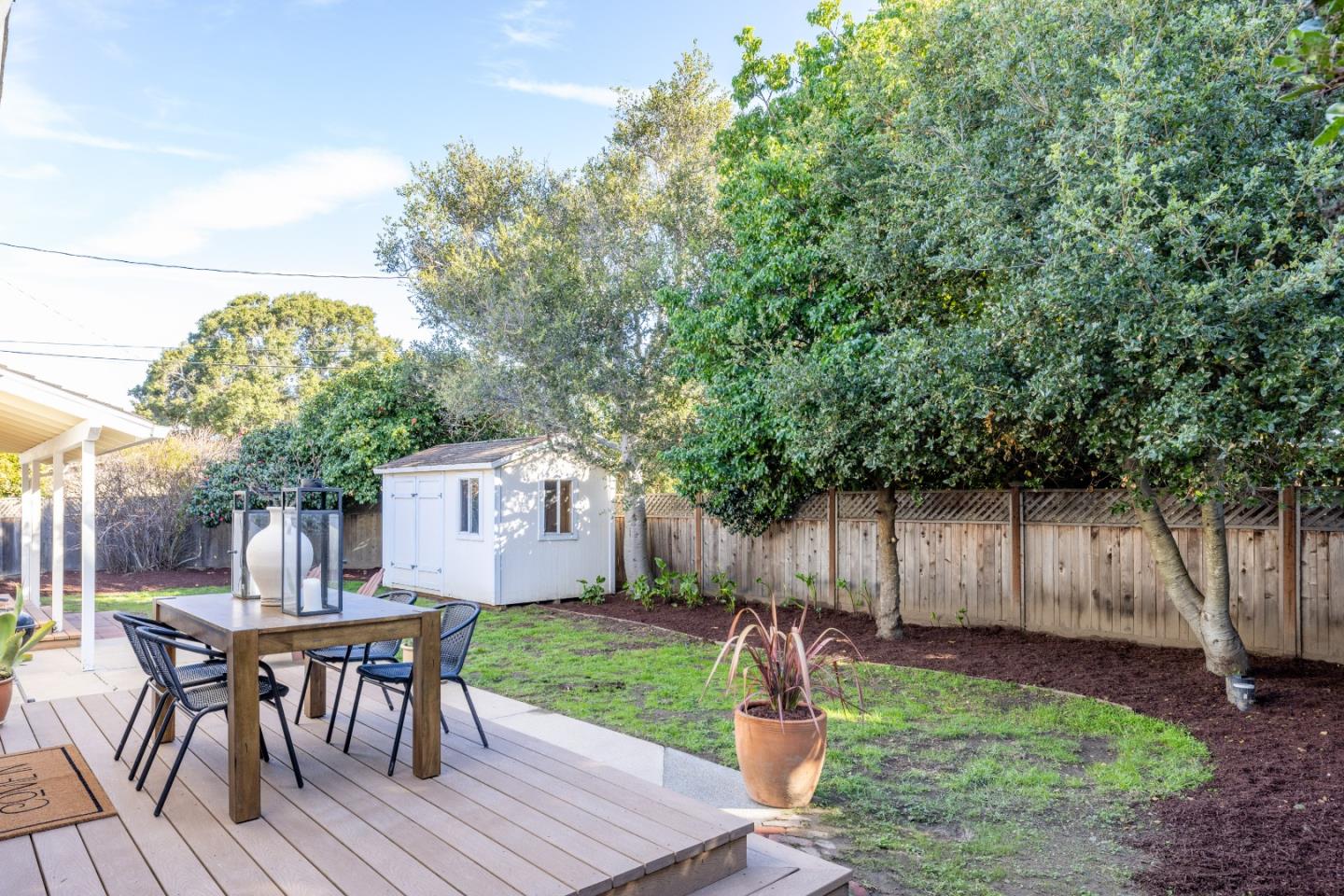 26571 Aspen Place Carmel, CA 93923 - Photo 33 of 46 a front view of a house with garden and patio