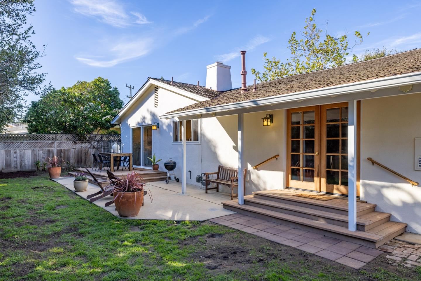 26571 Aspen Place Carmel, CA 93923 - Photo 35 of 46 a front view of a house with garden and sitting area