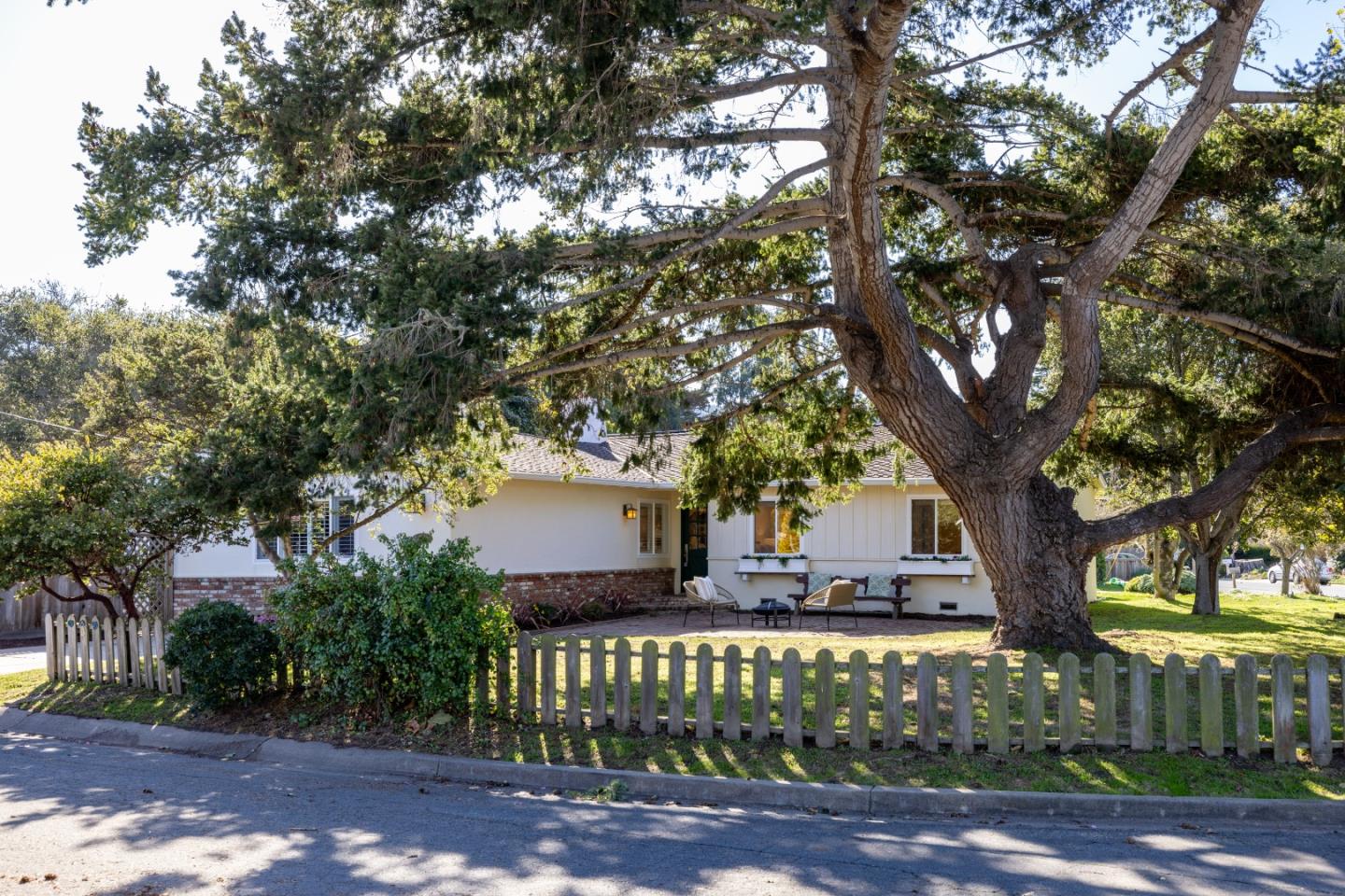 26571 Aspen Place Carmel, CA 93923 - Photo 37 of 46 a view of a house with a tree in the yard
