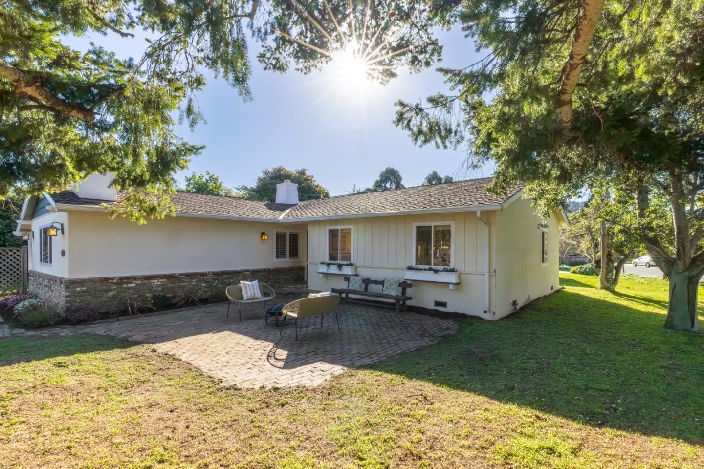 26571 Aspen Place Carmel, CA 93923 - Photo 38 of 46 a view of a house with backyard and sitting area