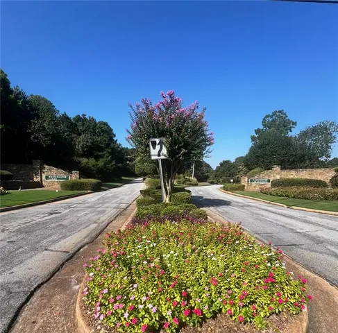 a view of a garden with a pathway