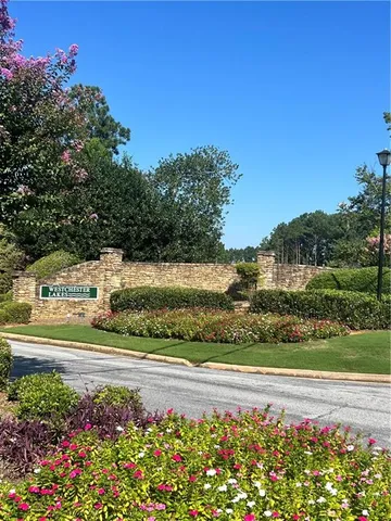 a view of a pathway with a big yard