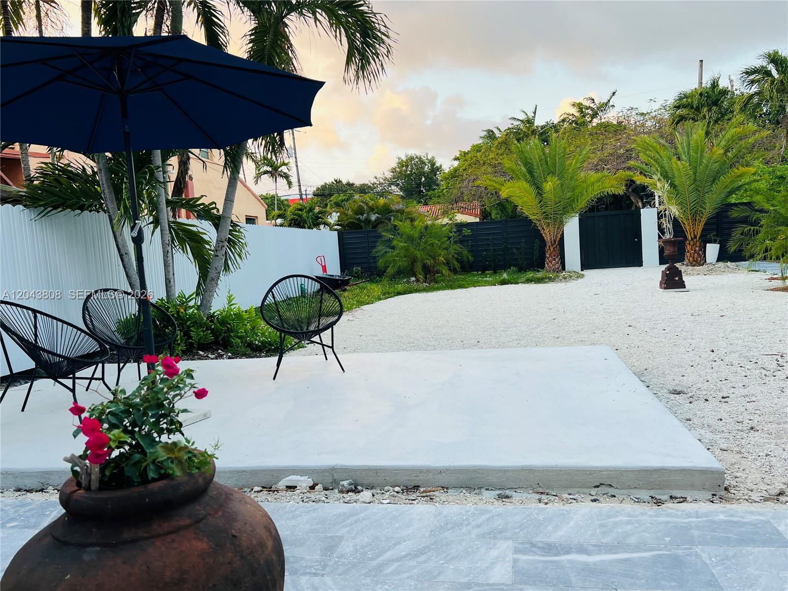 2134 Southwest 11th Street Miami, FL 33135 - Photo 5 of 13 a view of a backyard with potted plants