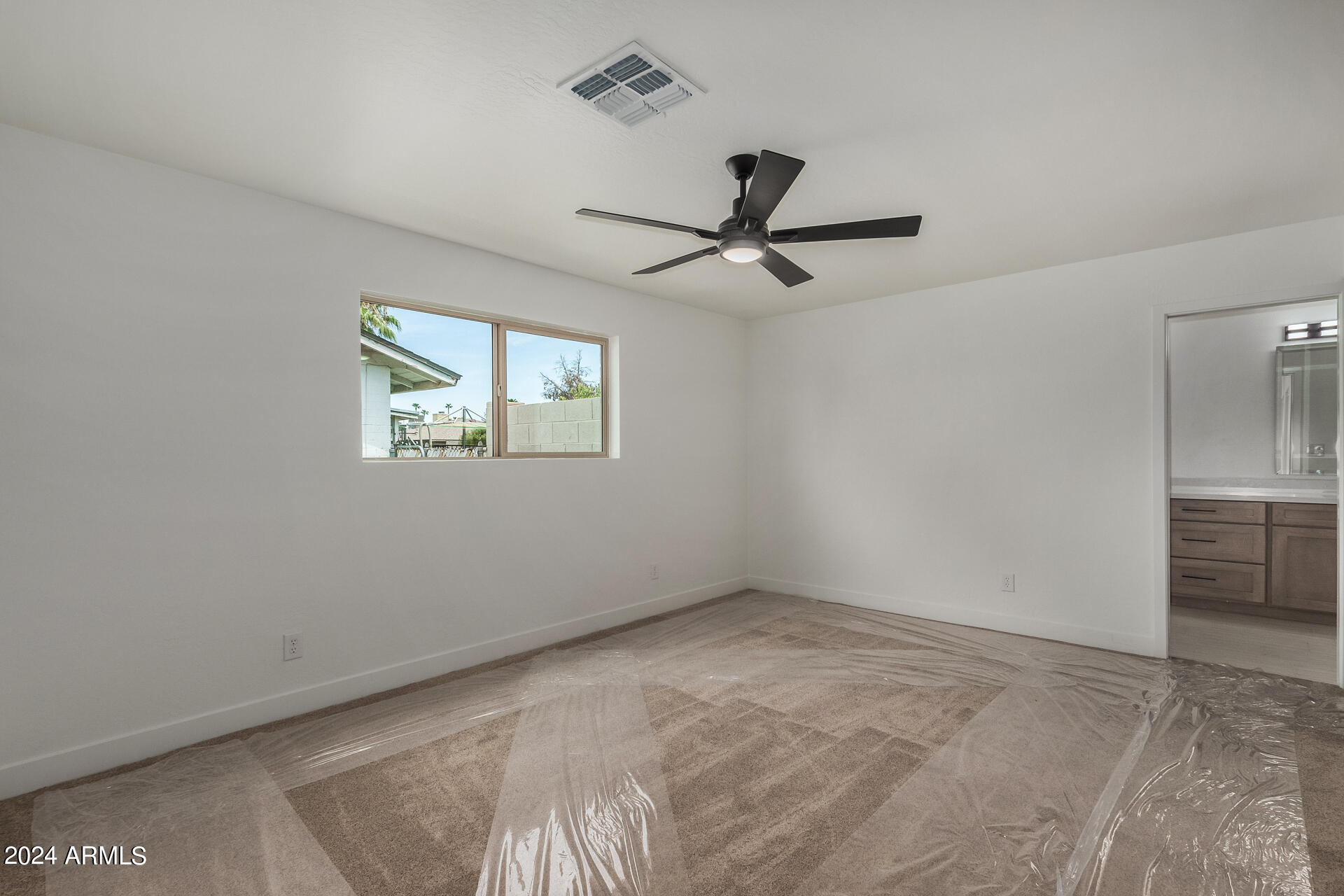 4109 West Hatcher Road Phoenix, AZ 85051 - Photo 19 of 33 a view of empty room with windows