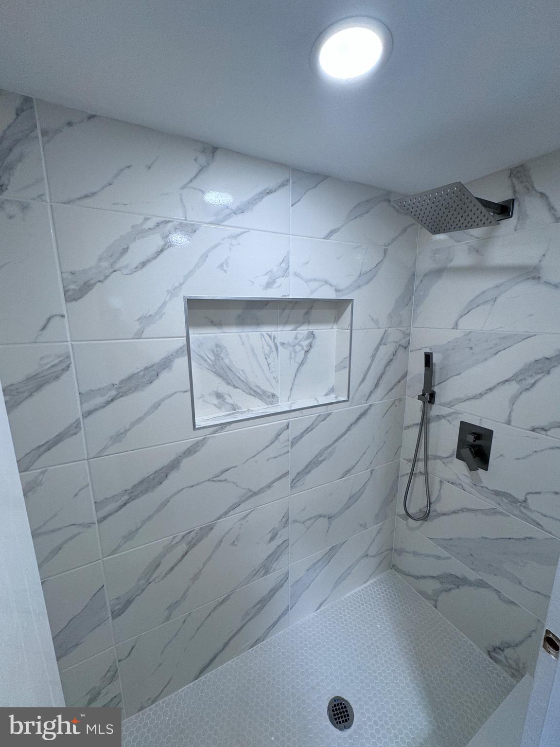 4667 Hawthorne Street Philadelphia, PA 19124 - Photo 12 of 21 a bathroom with a shower