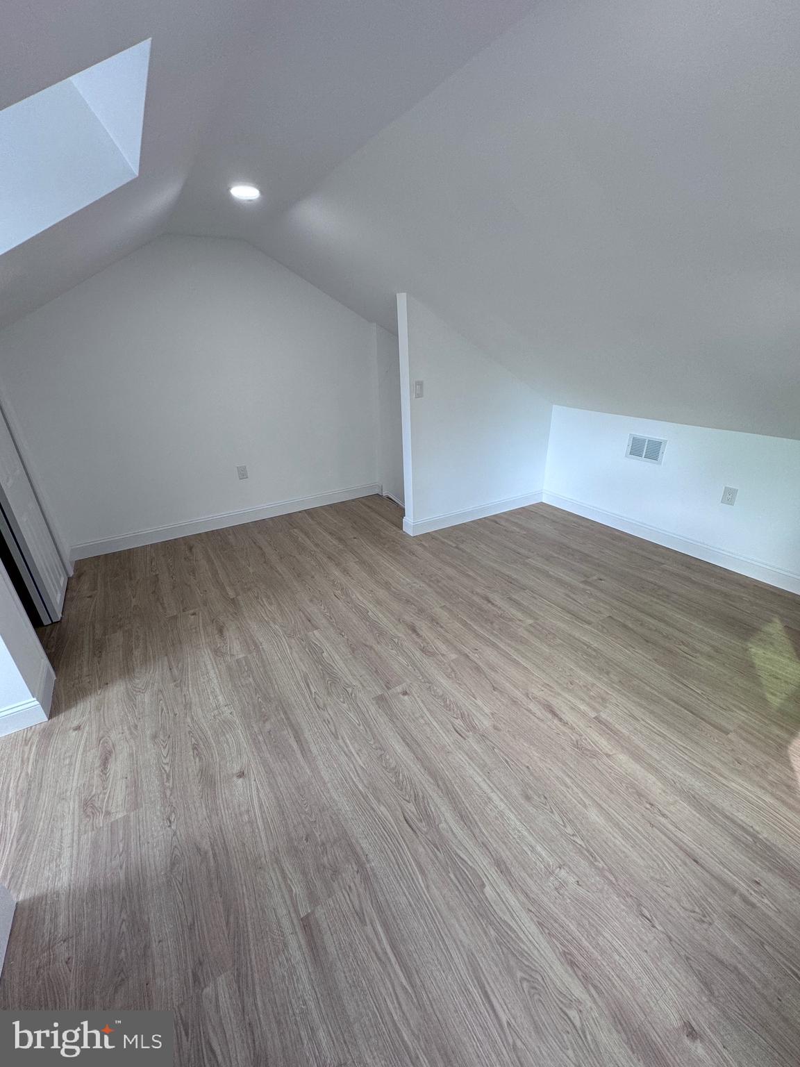 4667 Hawthorne Street Philadelphia, PA 19124 - Photo 15 of 21 a view of a room with wooden floor