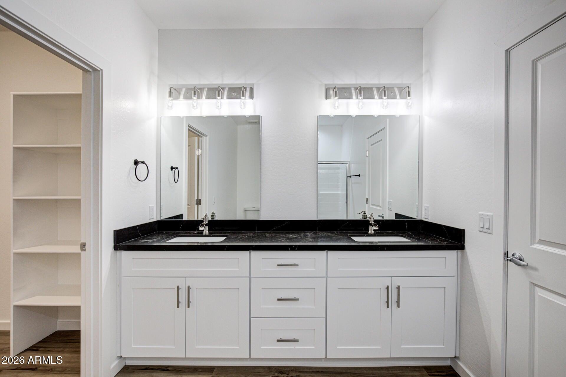 2002 East Thunder Mountain Payson, AZ 85541 - Photo 17 of 34 a bathroom with a granite countertop sink and a mirror