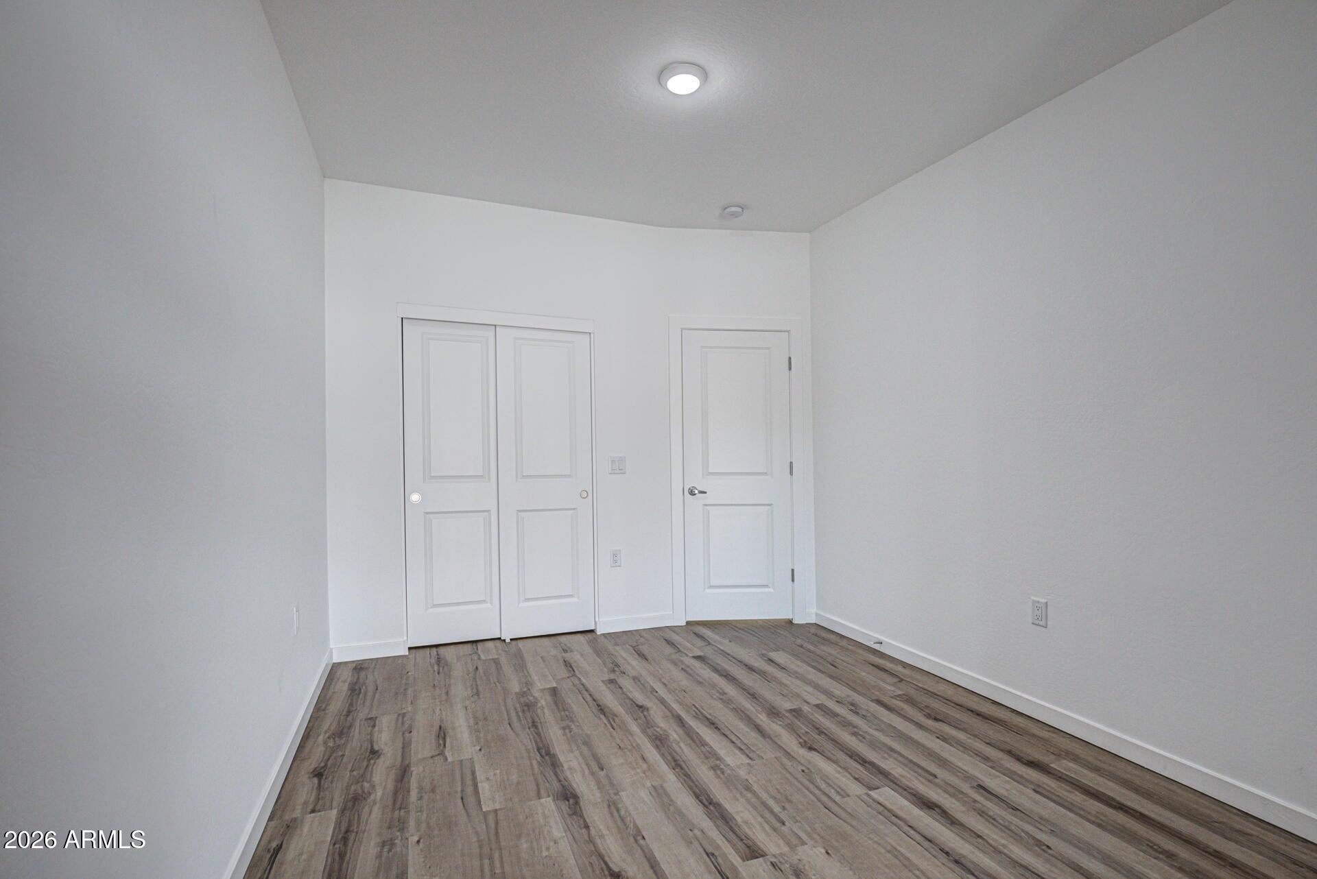 2002 East Thunder Mountain Payson, AZ 85541 - Photo 24 of 34 a view of a room with wooden floor and white walls