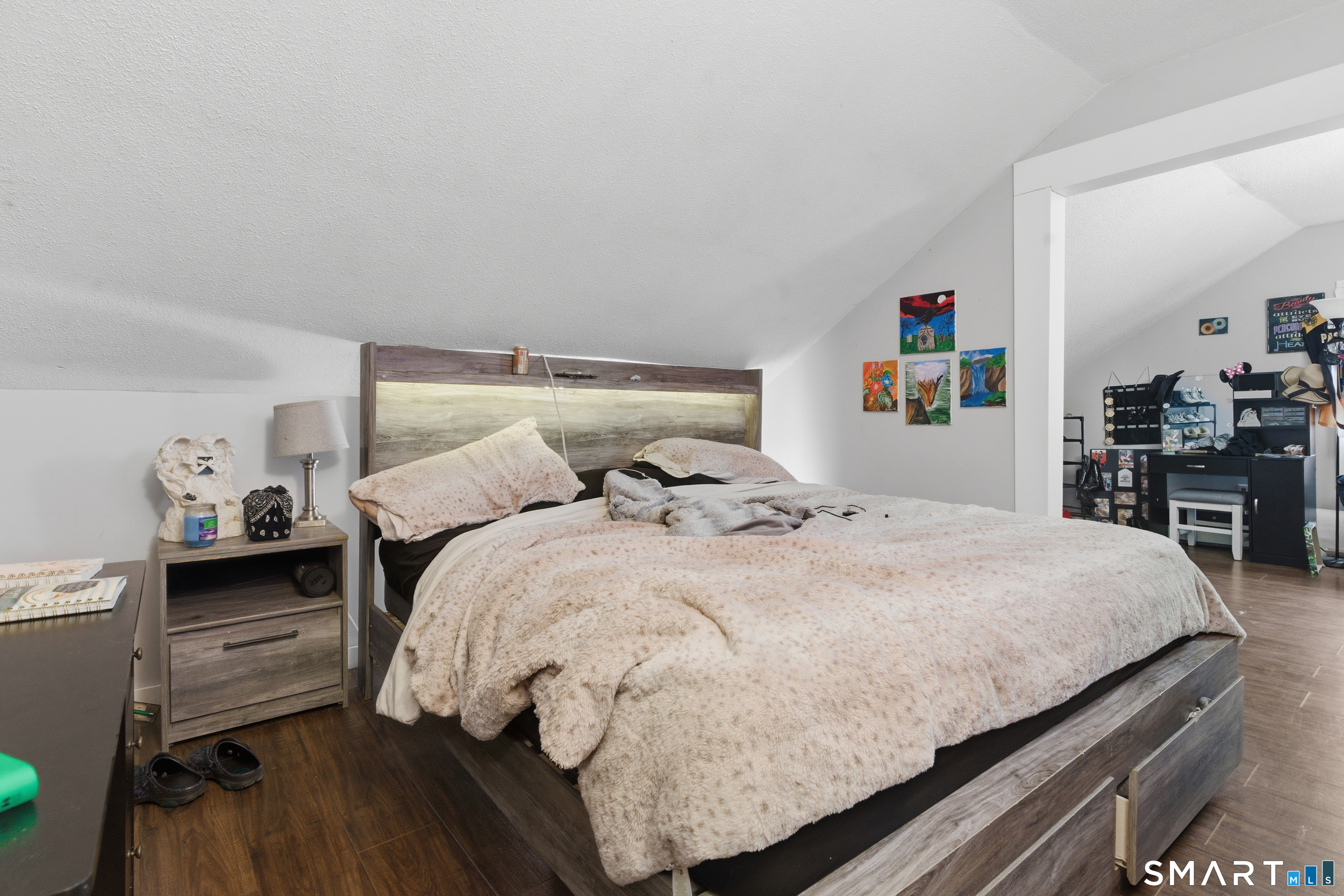 36 Church Street Killingly, CT 06241 - Photo 28 of 39 a bedroom with a bed and a table in it