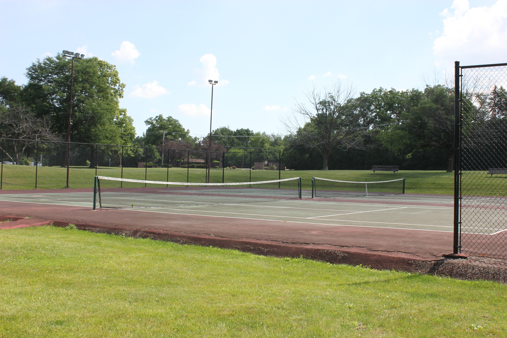 420 Walnut Creek Road, Unit 3105 Lisle, IL 60532 - Photo 15 of 15 a view of a tennis court