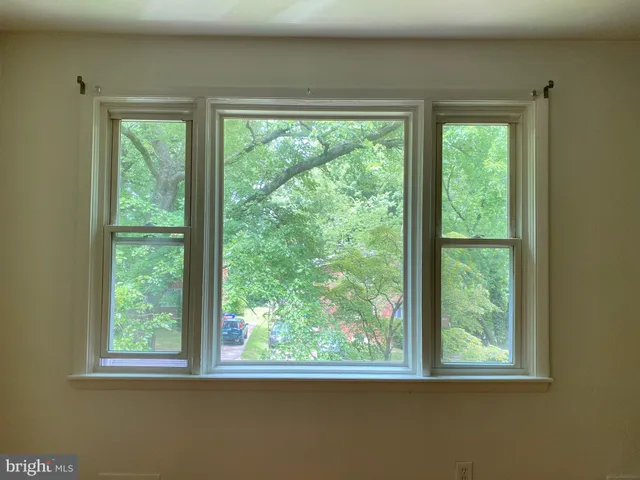 a view of a room that has a window
