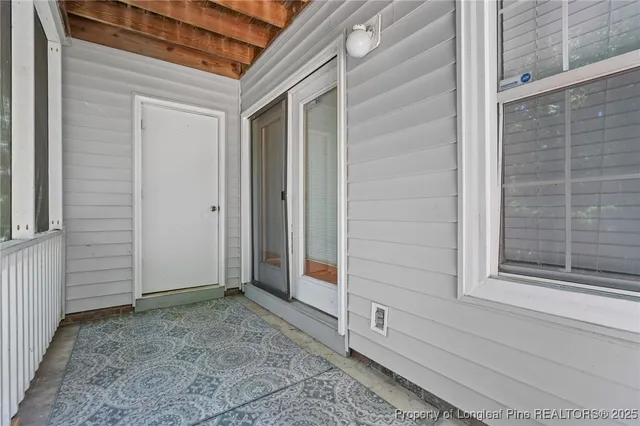 a view of porch with a swing